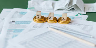Closeup of documents and receipts in preparation for tax season